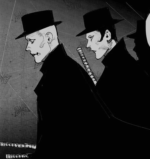 V agents in black suits and fedoras